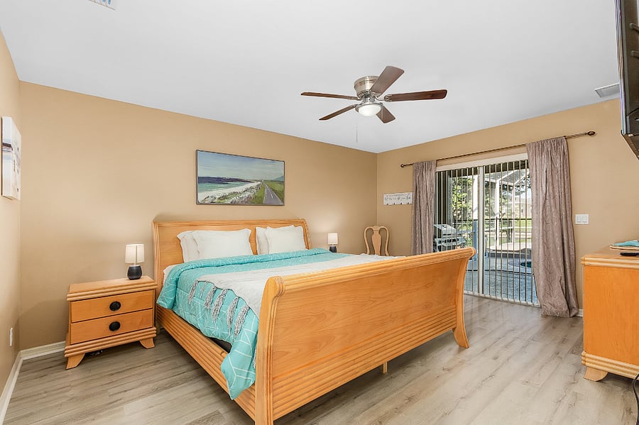 Master bedroom with lanai and pool access