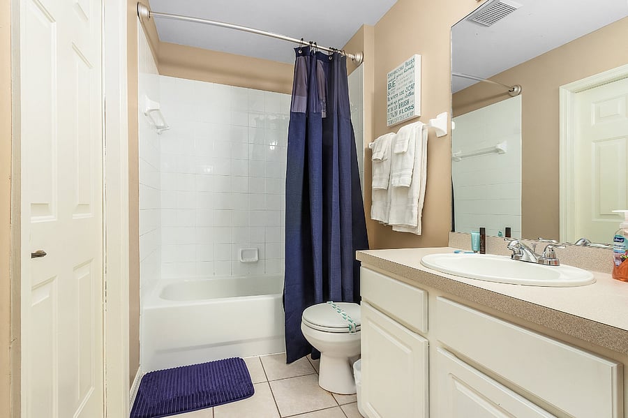 bathroom 2 with direct pool access door