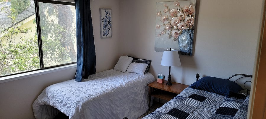 2nd bedroom: trundle bed, bed by window can be lowered to floor if needed for a small child, or lowered and put under main bed if more floor space is desired