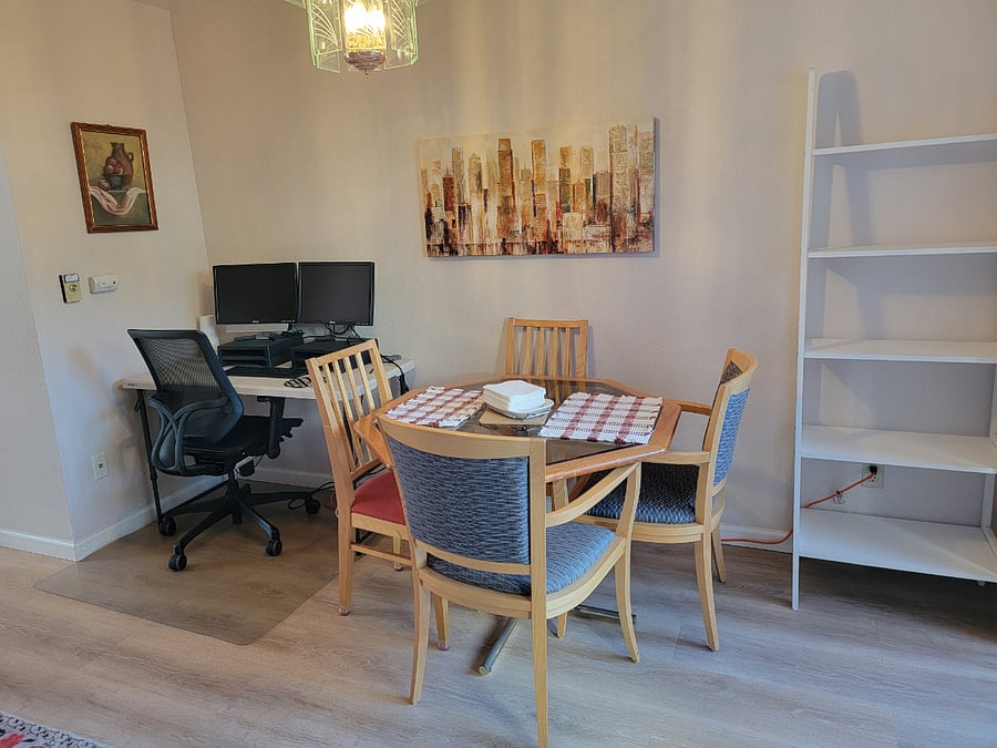 Dining area with laptop working station (can be easily taken down if more dining area is desired)