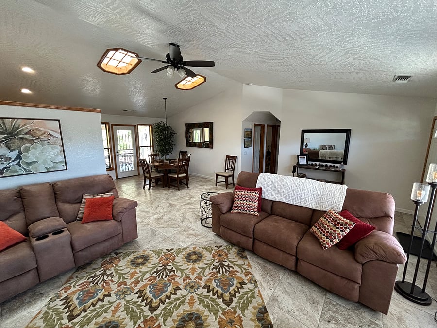 Skylights keep the room bright and a ceiling fan provides a cooling breeze on hot days.