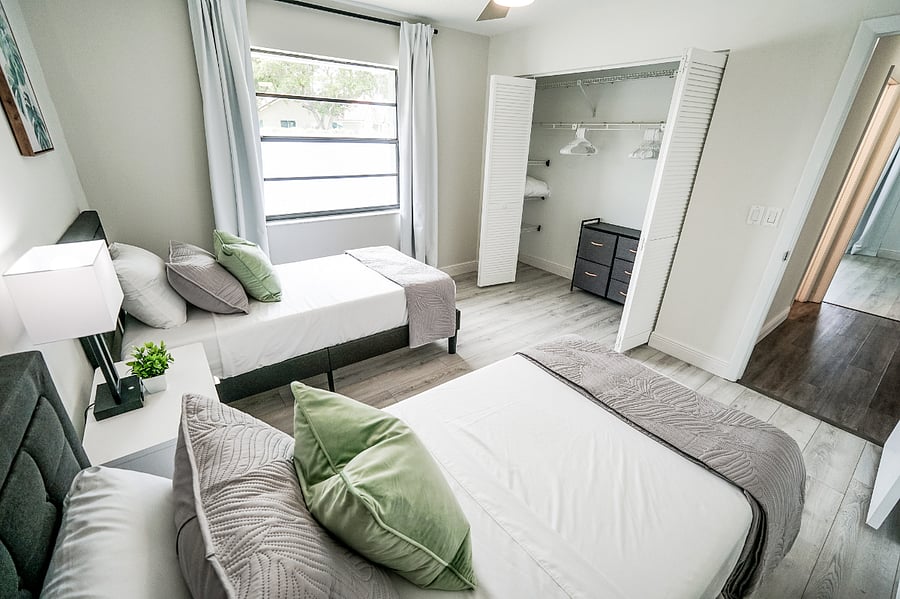 Two twin beds/ closet with storage