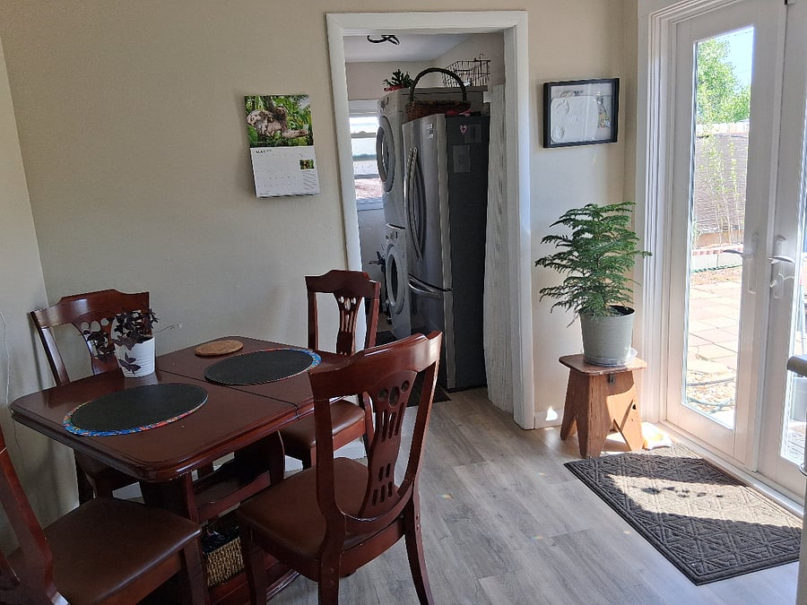 kitchen, where you can eat, French door leads to the backyard.
