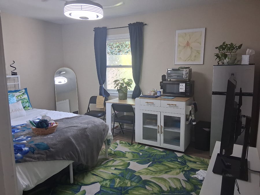 Frig, microwave, toaster oven, cookware for both, dishes, keurig, silverware, glasses, usb jacks, two set of sheets and blankets, 3 pillows, 