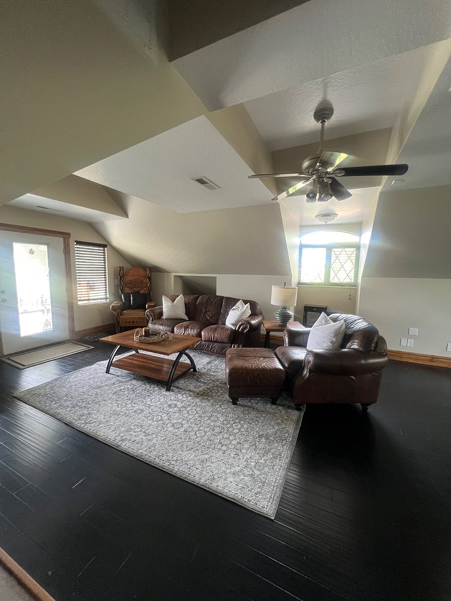 Open floor concept with kitchen, sitting/dining area and large private patio balcony