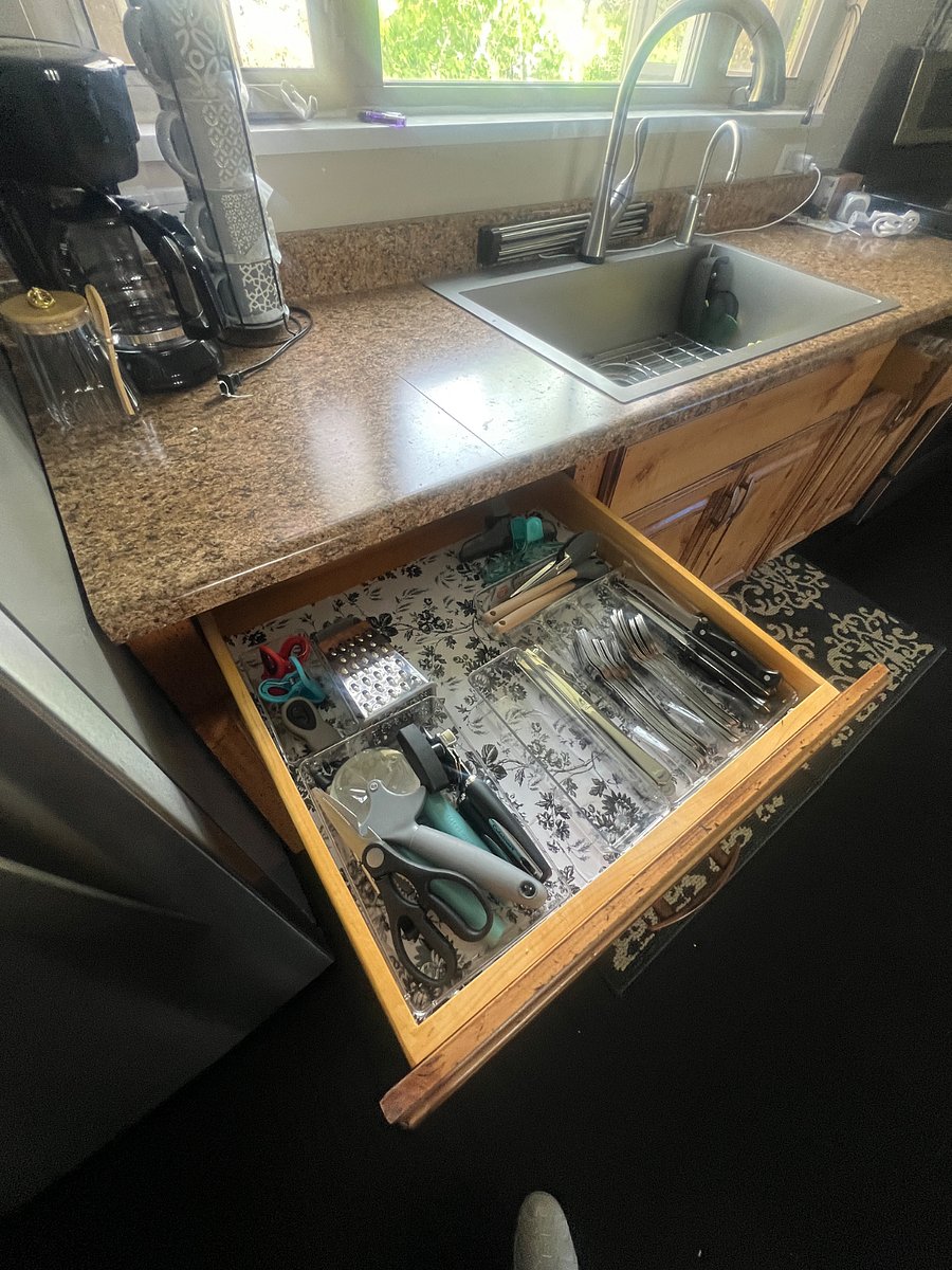 Fully equipped kitchen with small appliances and cooking utensils