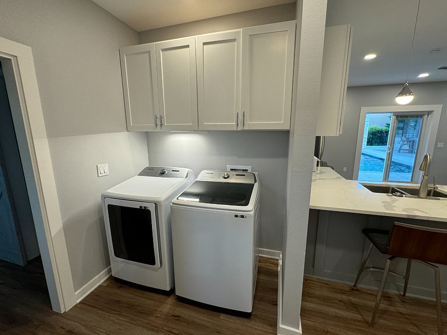 Laundry Area - washer and dryer, plus ironing board and iron