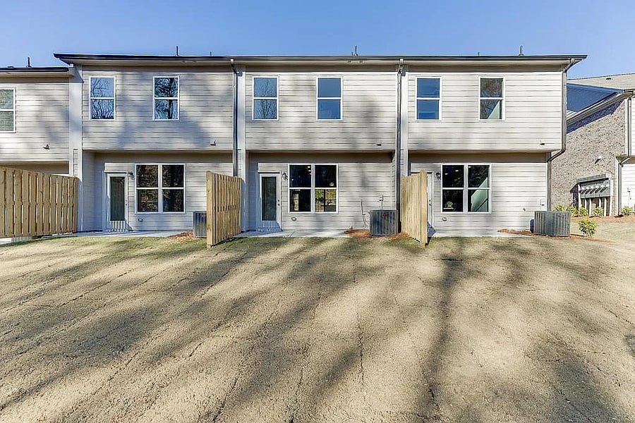 Private patio space outside with a good size common grassy area shared with the other units.