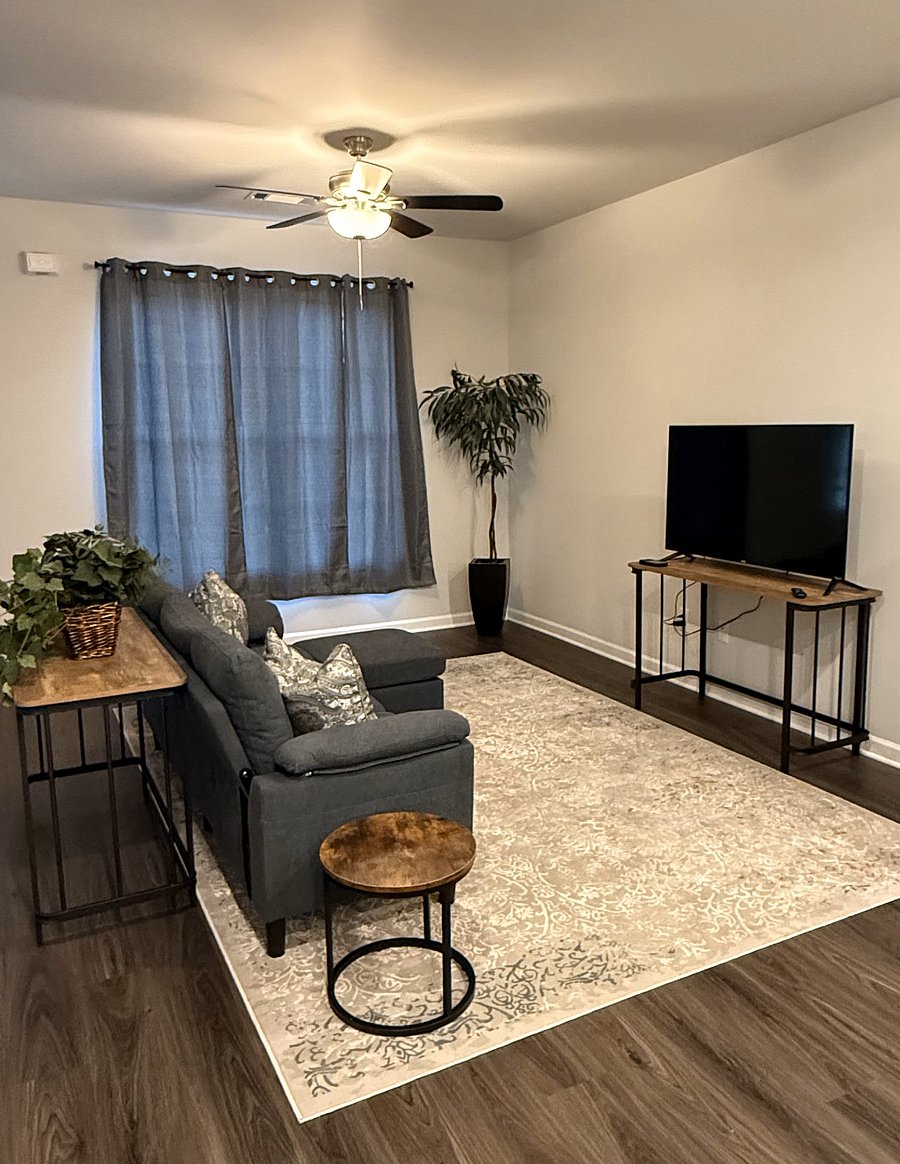 Common living area space with Smart TV.  Unit has wi-fi.