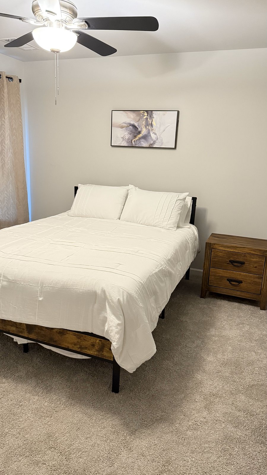 Bedroom #1 with private in-suite bathroom and walk-in closet.
