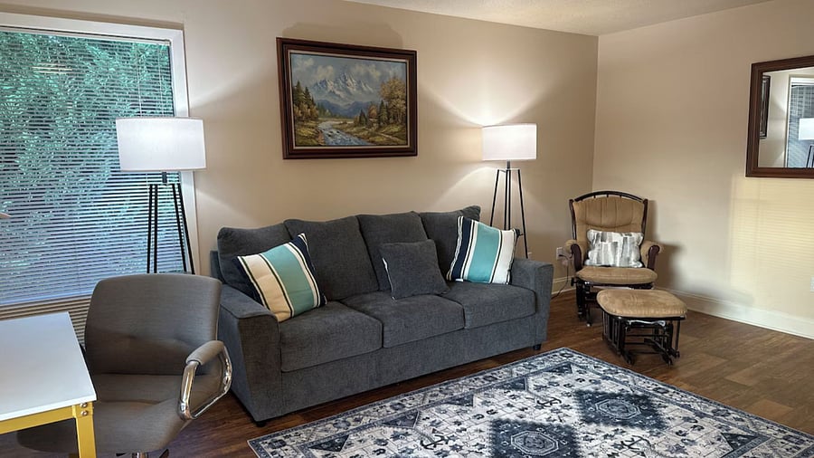 Couch, chair and reading lamps. 