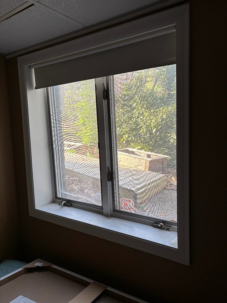 window out the bedroom - has a blind.. over looks pathway