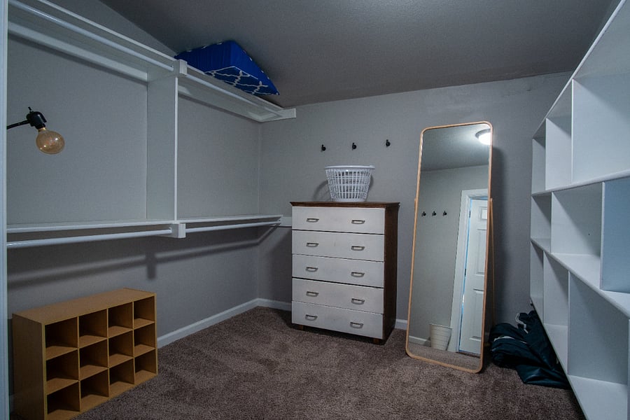 Primary Bedroom Walk-in Closet, plenty of storage space
