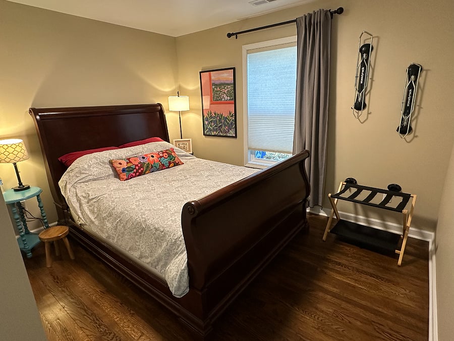 Secondary bedroom with closet and two bike racks