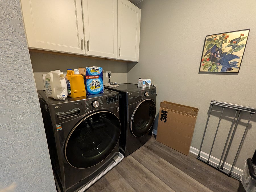Upstairs laundry room eliminates unnecessary trips up and down stairs with laundry baskets. Fully stocked with detergent, stain remover, oxiclean and dryer sheets.