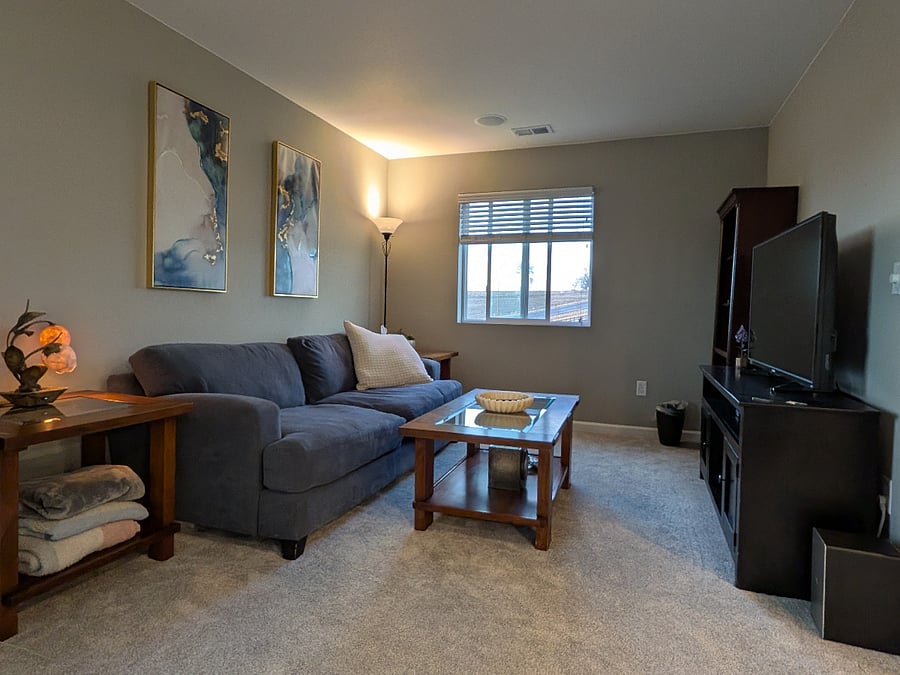 Loft living space, 55" smart TV with 2.1 speaker system.