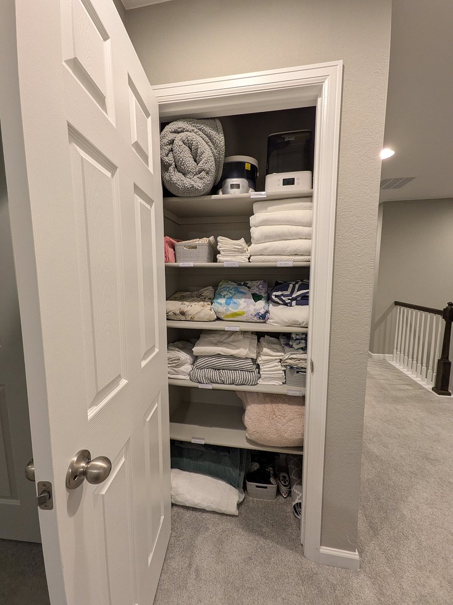 Linen closet with towels, blankets, and extra sheets for each bed.
