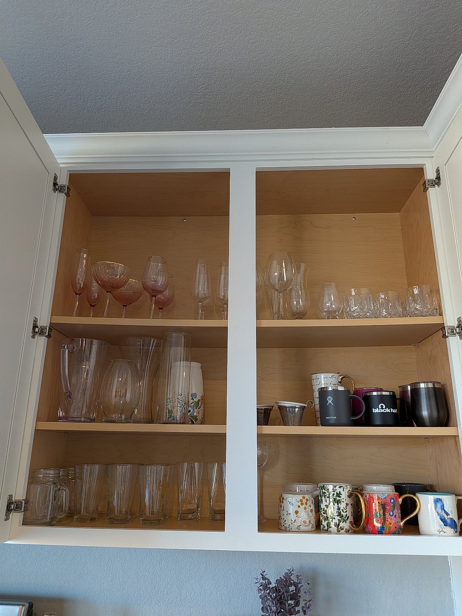 Full set of glasses and mugs. Stemware for drinks.