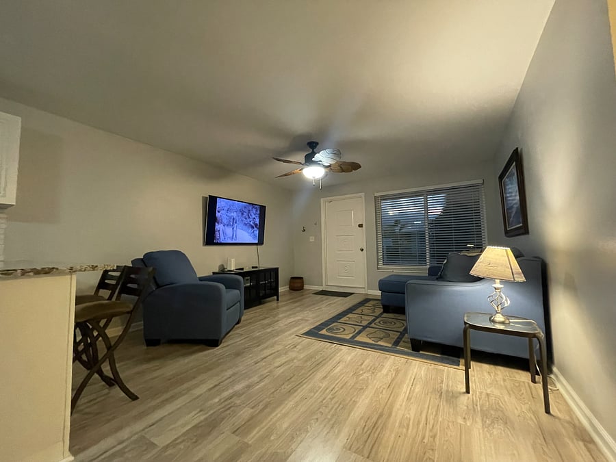 Spacious living room with TV and internet.