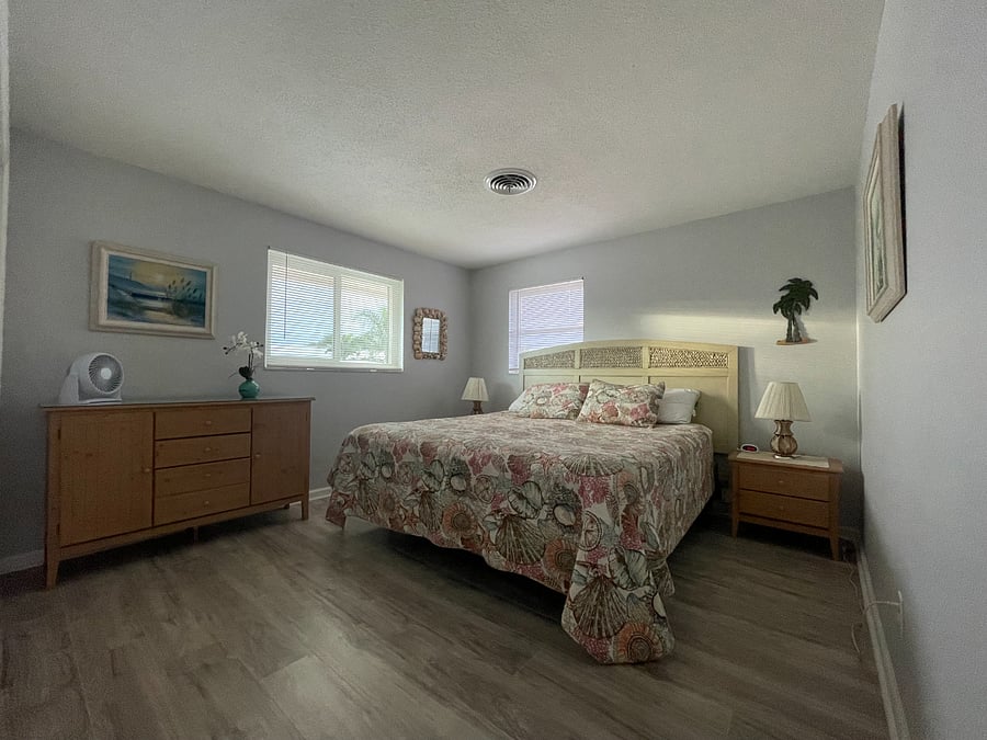 King sized bed with bureau and double closets