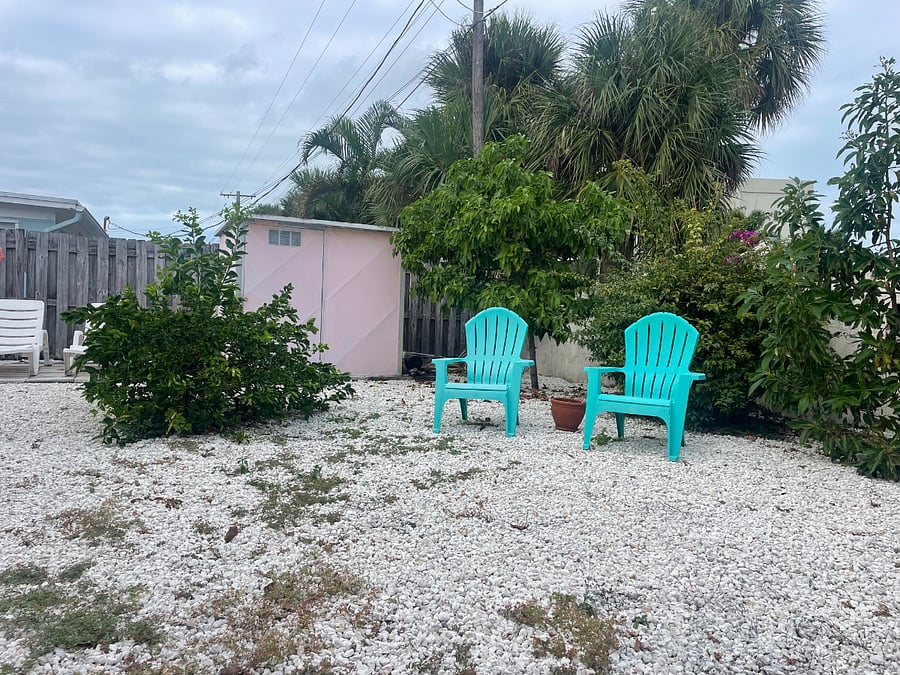 Fenced in yard with shed, bicycles & two beach chairs too!