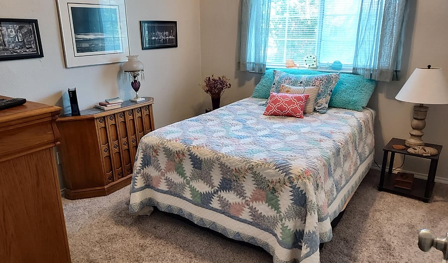 2nd bedroom with large dresser