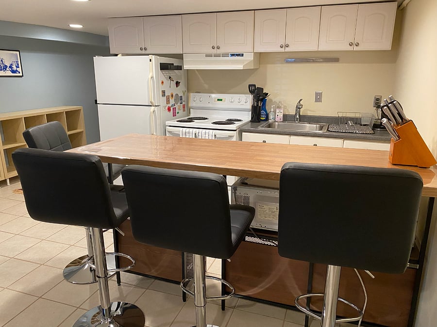 Dining counter seats 4, and provides extra space for food prep and cooking!