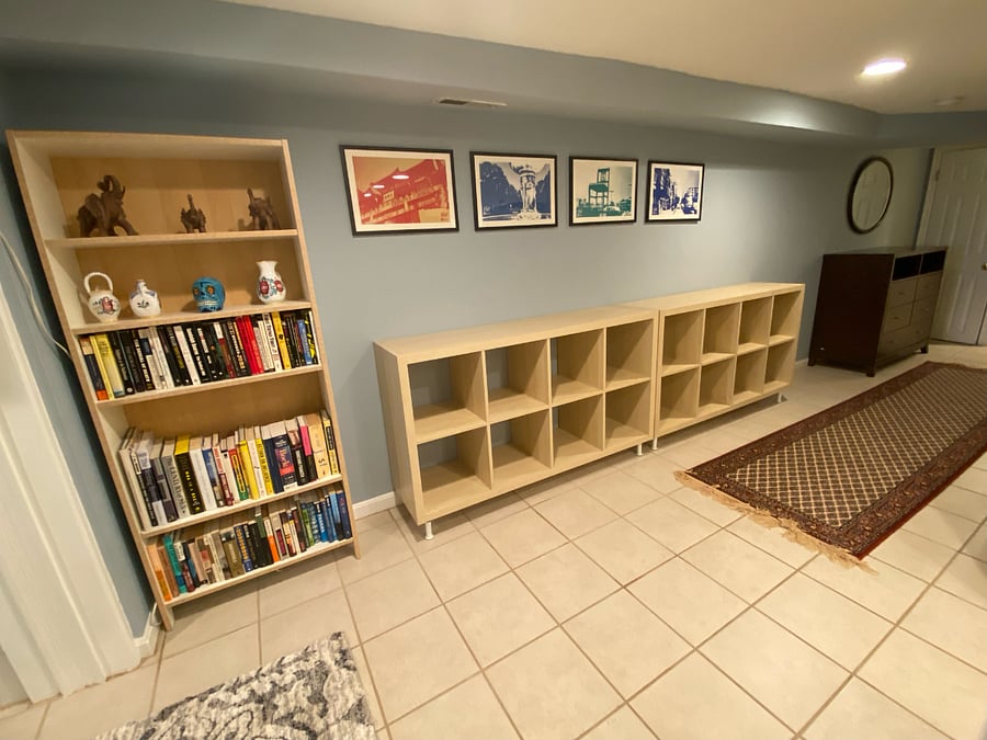 Hallway cabinets with new shelving for additional storage/organizational needs and original art from DC artists depicting iconic neighborhood scenes!