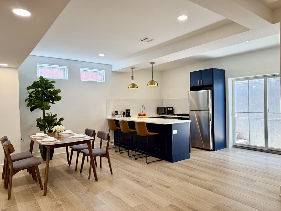 Dining and kitchen full of light