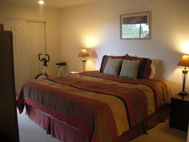 King size bed and exercise bike