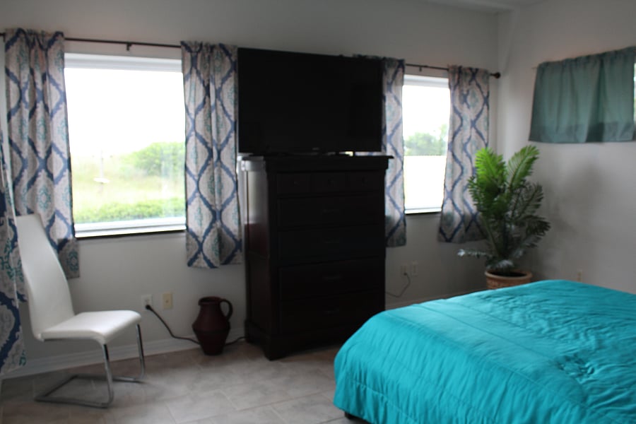 First floor bedroom with view of the beach dunes