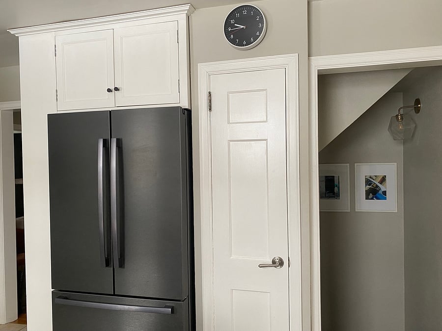 Other side of the kitchen and entrance into the lower level.