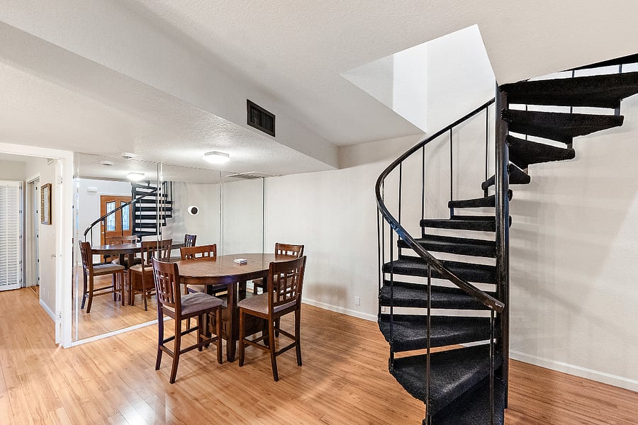 The dining area, just off the kitchen, is seemlessly integrated into the open-concept layout, creating a natural flow between the kitchen and living space.