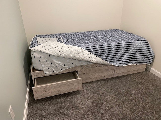 Set of twin beds in adjoining room of Master Bedroom