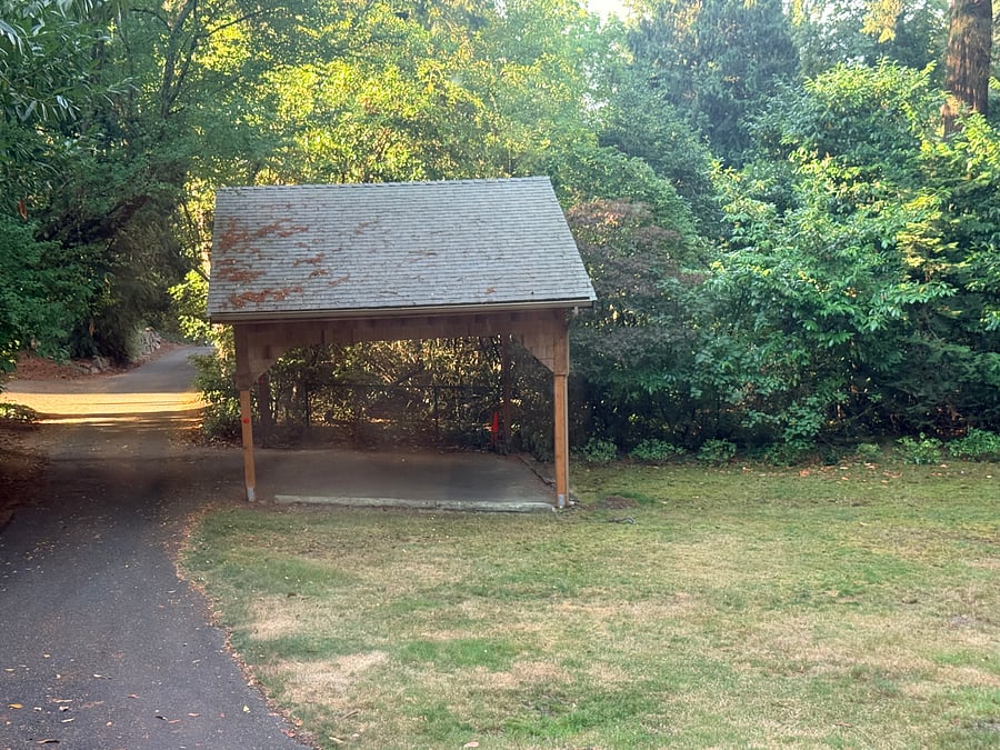 One covered parking space in our driveway under this carport