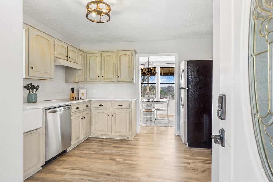 Kitchen cabinets have a rustic finish on them, they are not dirty.
