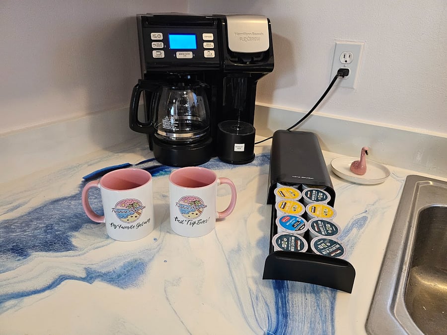 Because the first cup of the day matters coffee maker, pods, and Funshine mugs all stocked and ready for you