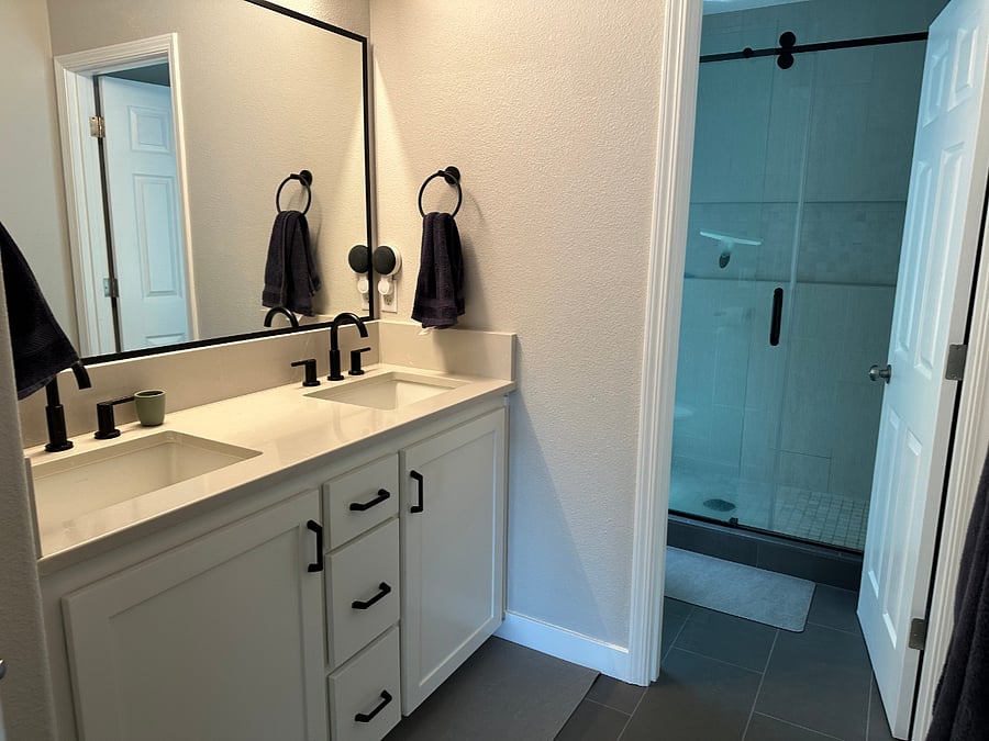 Main bedroom bathroom and tile shower