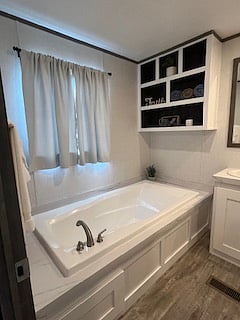 Master bedroom bathroom extra-large bathtub.