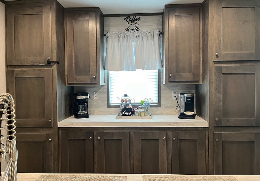 Coffee bar with a coffee maker and a Keurig.