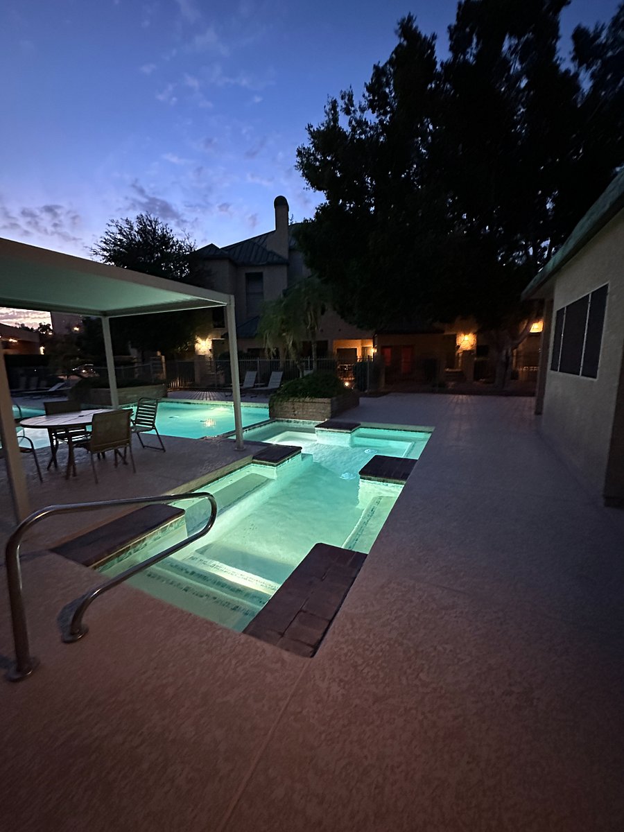 Main hot tube/spa overlooking the pool. Separated dedicated space holding heat to relieve tired aching muscles.