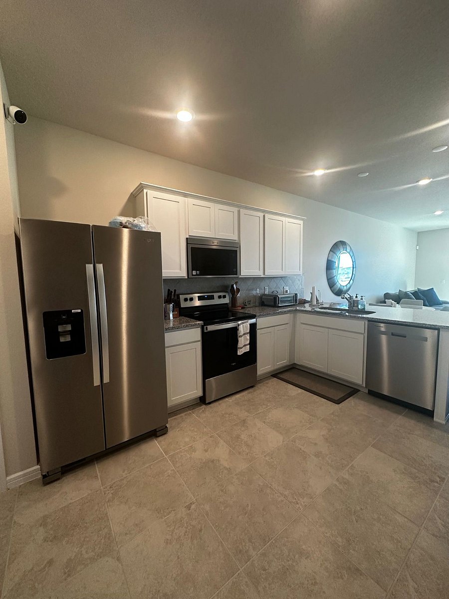 Fully equipped kitchen with all major appliances and essential kitchenware included.
