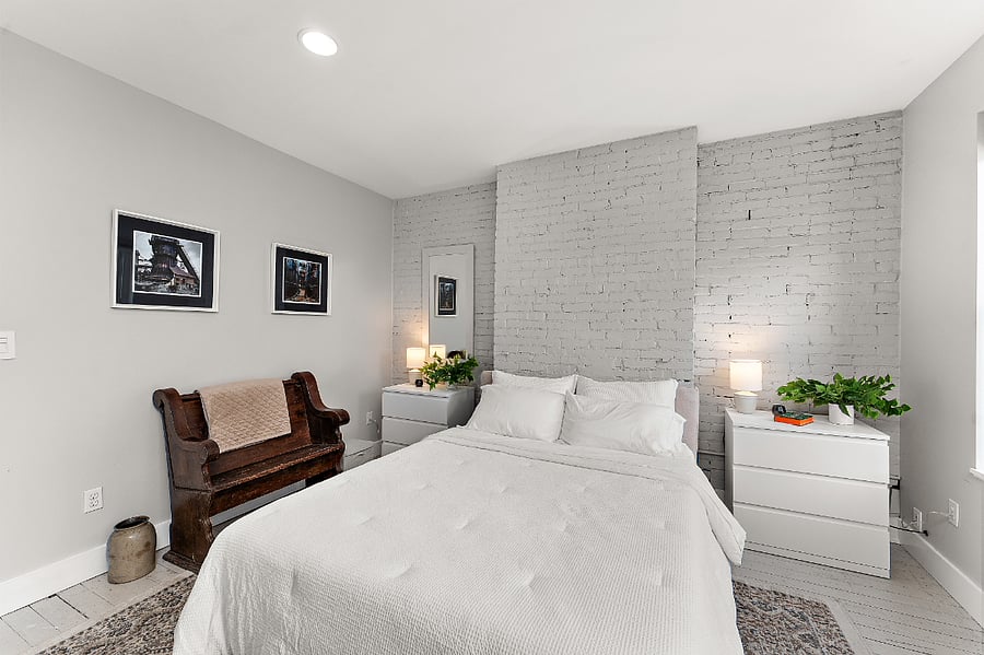 The White Room: Second floor bedroom with queen size bed and antique drafting table. Pittsburgh themed art of Carrie Blast Furnace and former Civic Arena.
