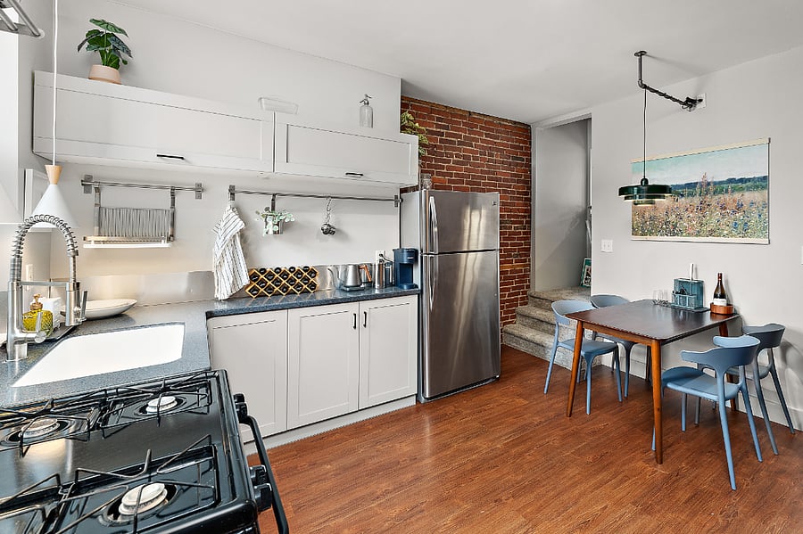 Bright, well appointed kitchen and dining area.