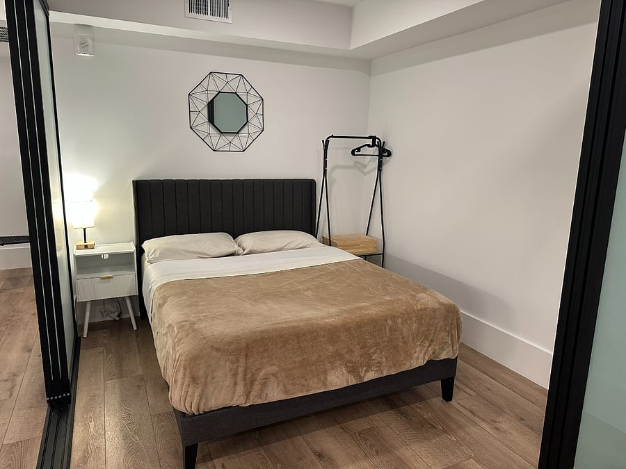 Queen size bed with memory foam mattress.