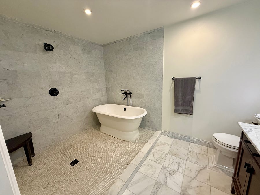 master bath features 2 shower heads. double sink