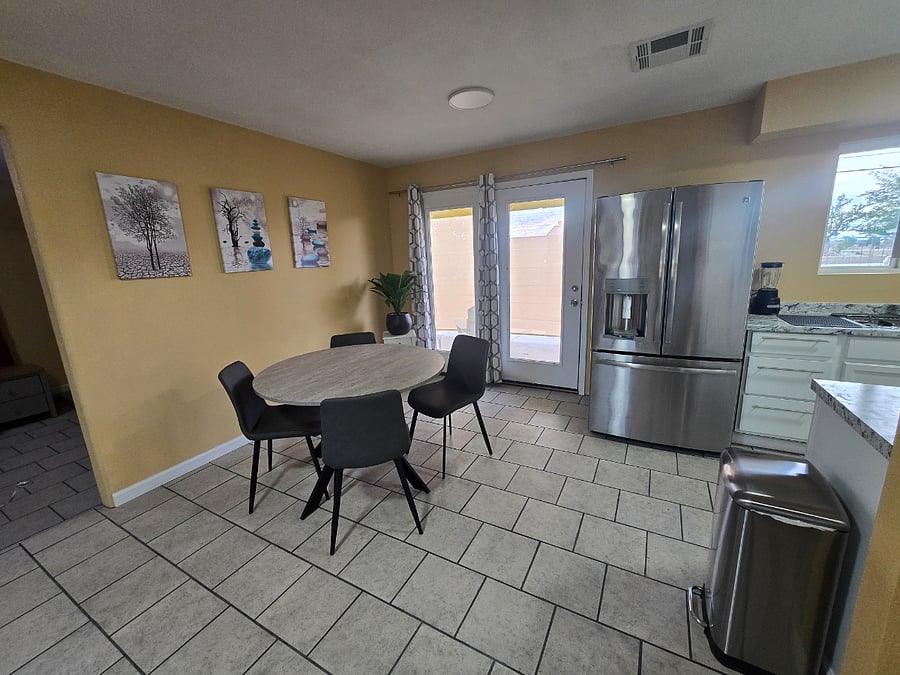 Dining. Full size fridge with ice maker and water dispenser.
