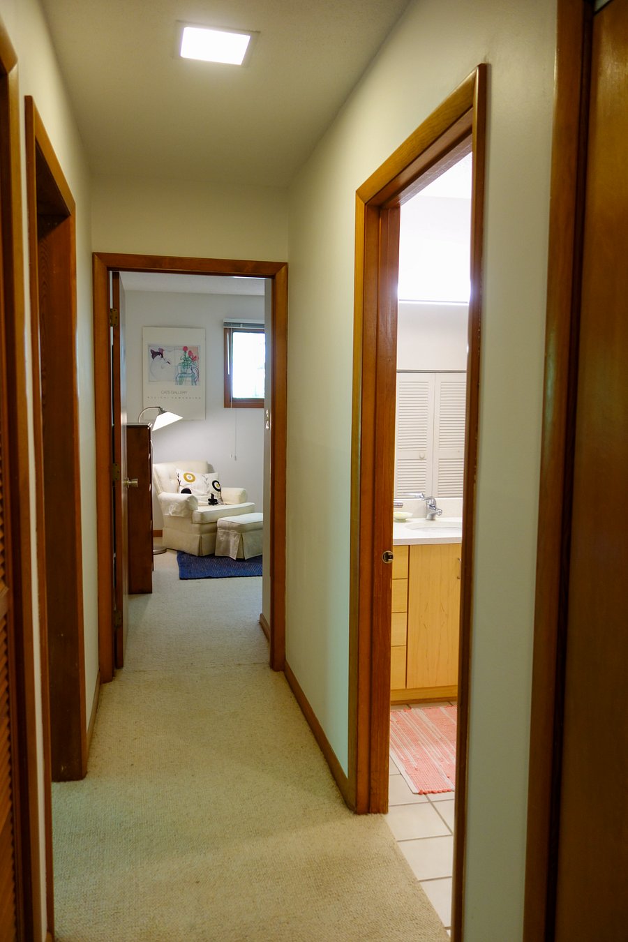 At the bottom of the stairs, take a right and you will find your bathroom on the right and your bedroom straight ahead.