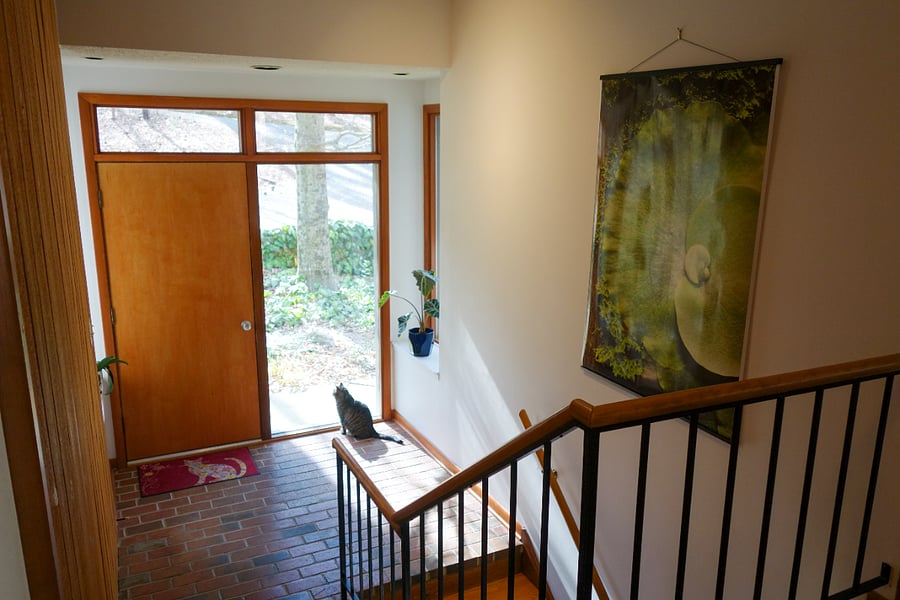 Another view of the foyer, from the top story of the house.  You go down the stairs, into the foyer, and then down a second set of stairs to access the lower story of the house.