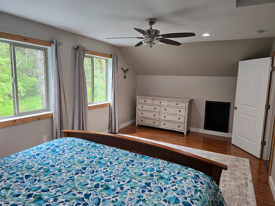 Bedroom with Dresser and Room Darkening Curtains